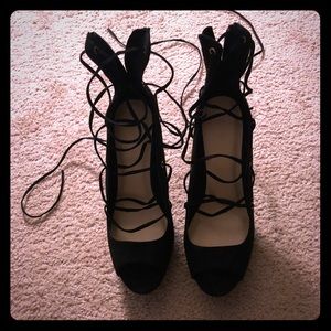 Black velvet heels. Never worn .